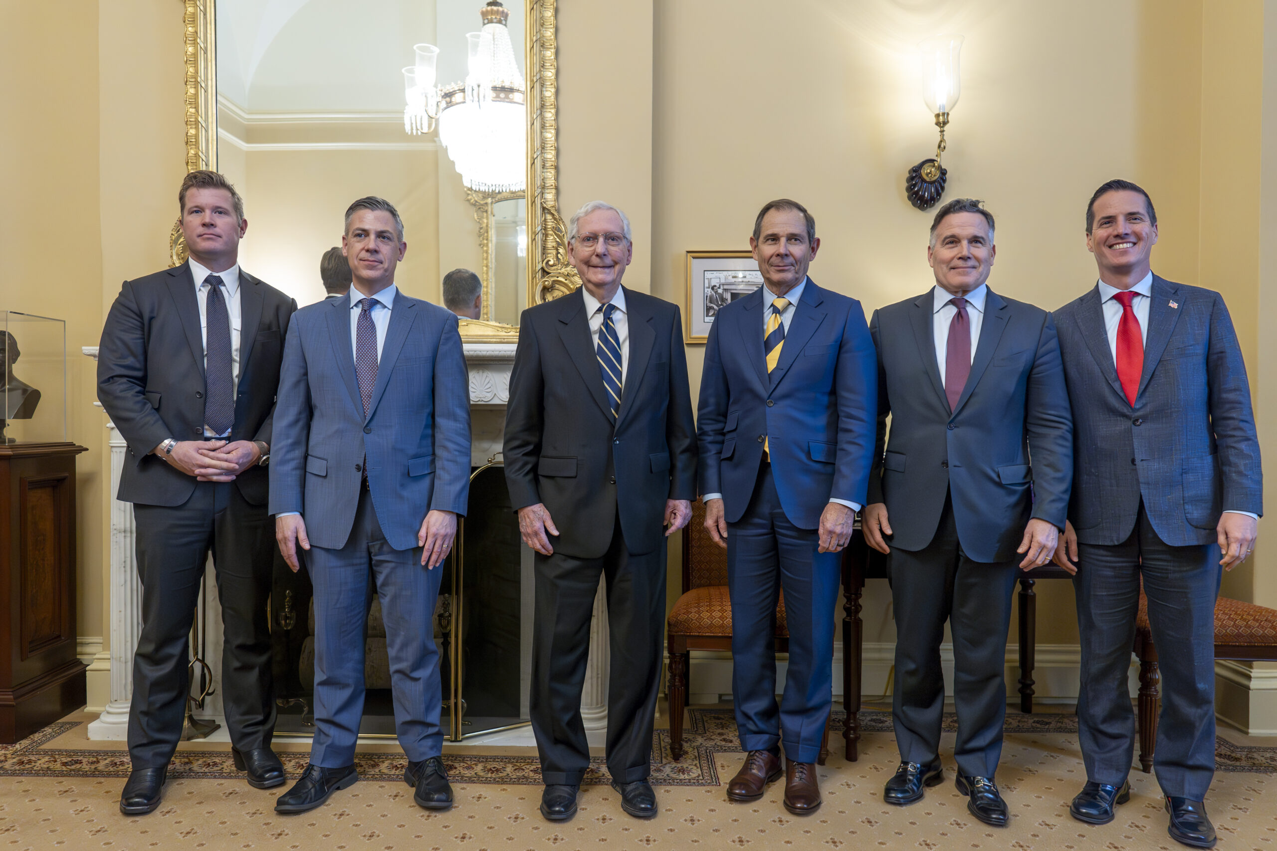 Senate Minority Leader Mitch McConnell, R-Ky., center, welcomes incoming Republican senators in his...