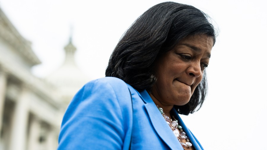 Image: The state of Washington's U.S. Rep. Pramila Jayapal of Seattle walks down the steps of the U...