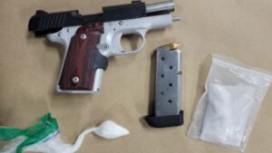 Photo: The firearm and substances allegedly found in Pham's vehicle.