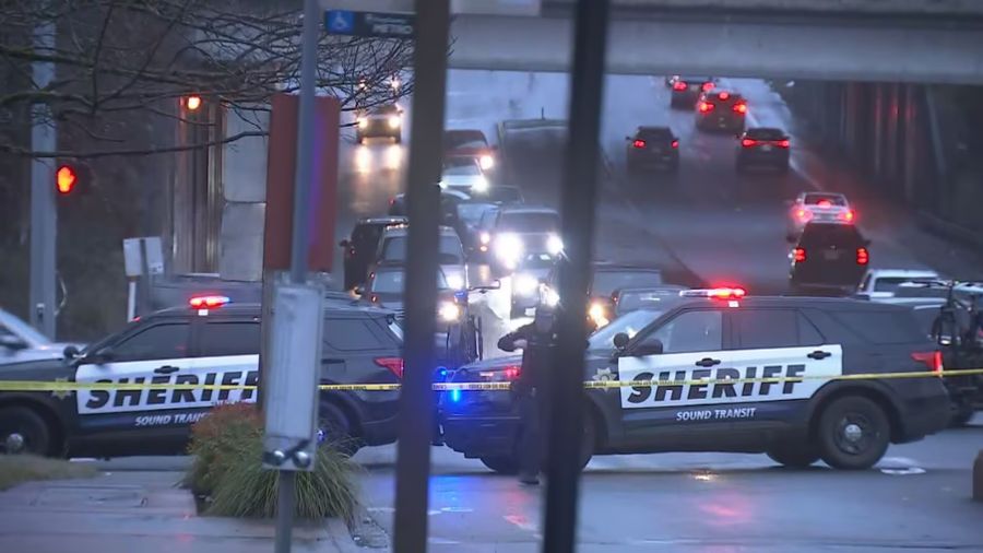 Photo; Officers respond to a shooting on a King County Metro bus....