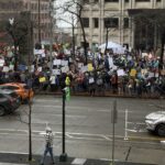 Around a thousand federal workers protest outside the federal building in downtown Seattle in a "Rally to Save Our Civil Services" on Feb. 17, 2025. (Photo: Jason Rantz, KTTH)