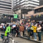 Around a thousand federal workers protest outside the federal building in downtown Seattle in a "Rally to Save Our Civil Services" on Feb. 17, 2025. (Photo: Jason Rantz, KTTH)