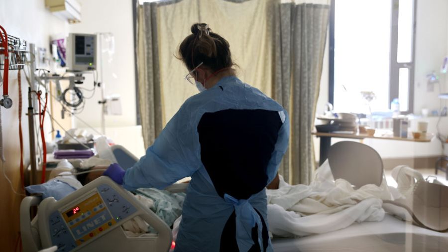 Photo: A nurse checks on a patient at Harborview Medical Center in Seattle, Washington....