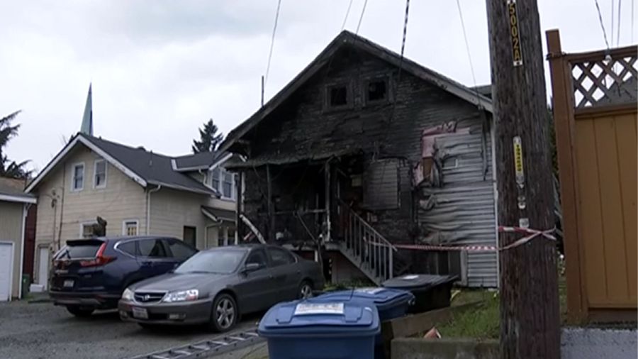 Fire burns back of home in Seattle's University District....