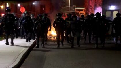 Around 30 'masked activists' arrested after taking over UW building, staging blockade