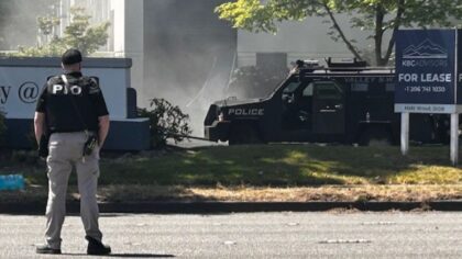 Ex-employee dies after allegedly setting fires, waving gun at Kent workplace