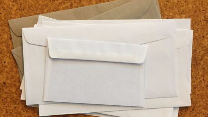 Former postal worker allegedly used scam letters to steal over $80K from WA charities, businesses
