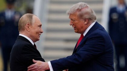 Trump and Putin shake hands warmly in Alaska to kick off their summit on the war in Ukraine
