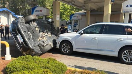 Police chase stolen car that ends up flipped near Tukwila gas station