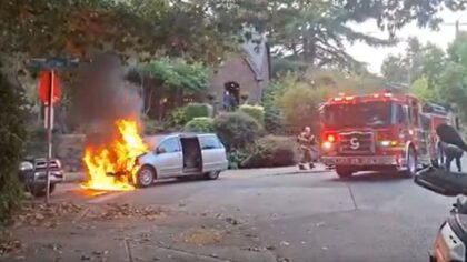 Seattle police say van with kids inside catches fire after man rams it