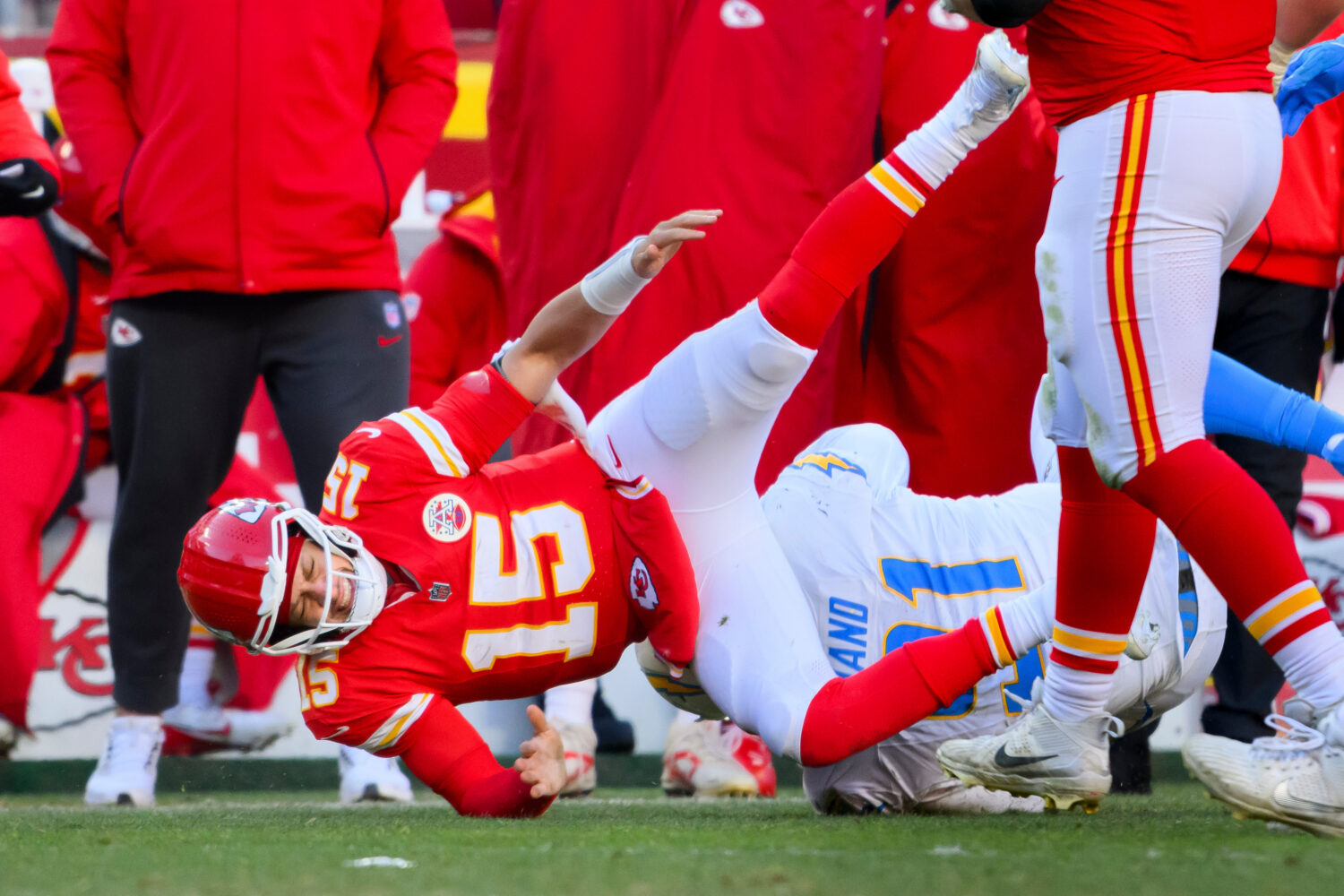 Kansas City Chiefs quarterback Patrick Mahomes (15) is injured after being tackled by Los Angeles C...