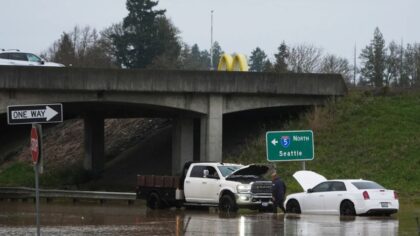 Record flooding threatens Washington as more heavy rain pounds the Northwest