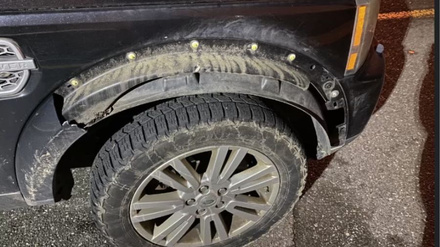 SUV damaged in storm wind...