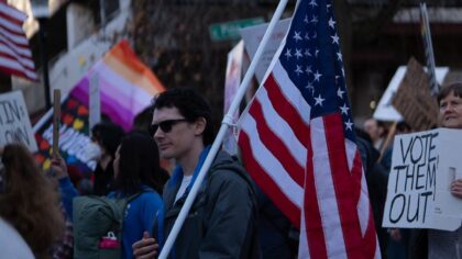 'Free America' rally marched through downtown Seattle, holds tribute for Renee Good