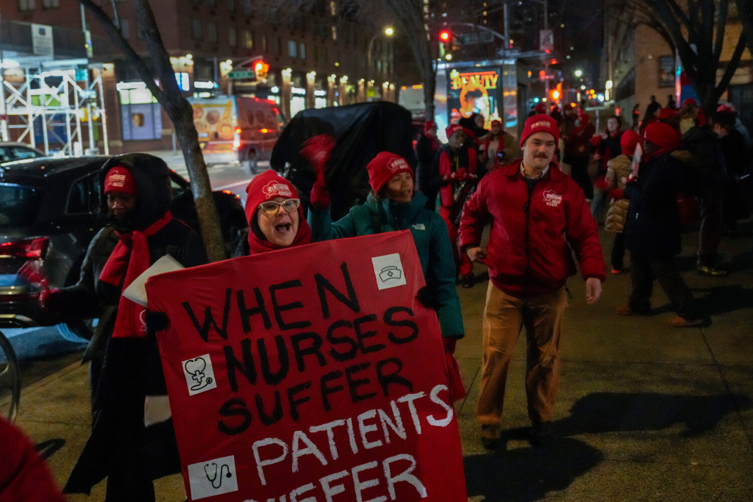 Nurses strike outside Mount Sinai West Hospital, Monday, Jan. 12, 2026, in New York. (AP Photo/Yuki...