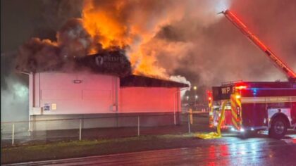 Fire destroys storage facility in University Place, multiple roads closed Friday morning