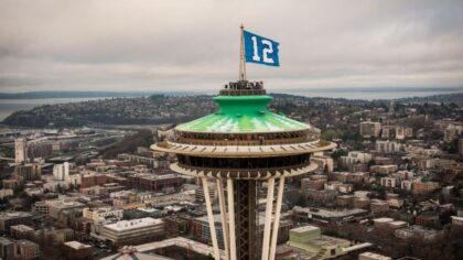Who should raise the 12th Man flag ahead of first divisional round playoff game since 2019?