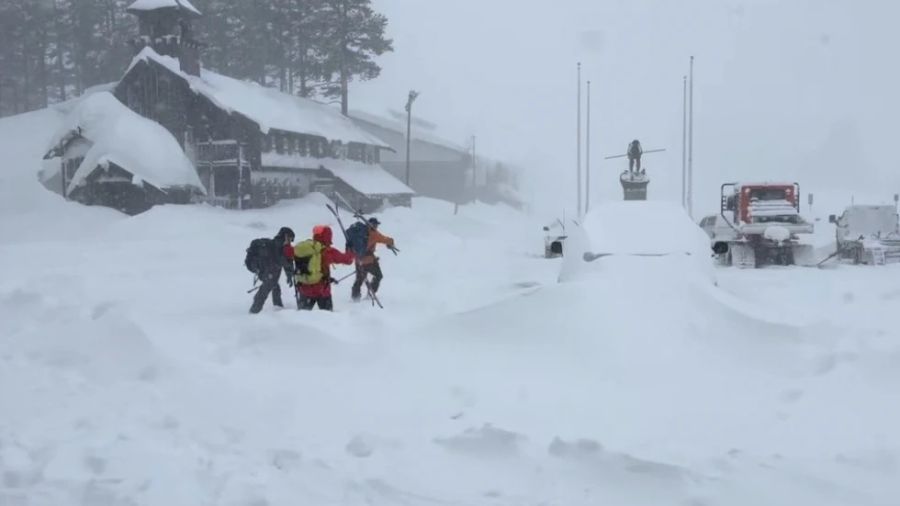california avalanche winter storm rescuers missing...