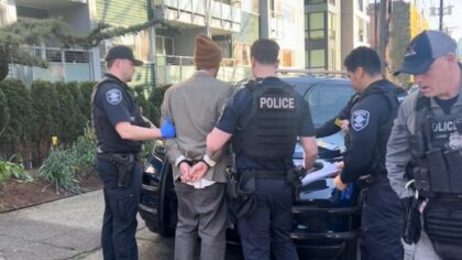 Man in custody after allegedly threatening people, barricading himself in Capitol Hill apartment