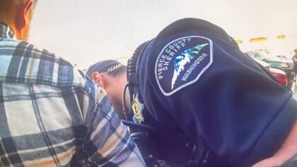 Tacoma man arrested after alleged drive-by shooting on his own family with child in car
