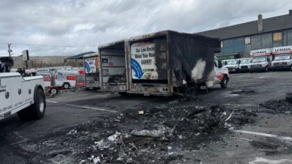 Several U-Haul trucks destroyed in early-morning Ballard parking lot fire