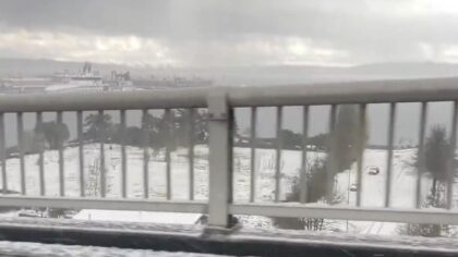 Snow, hail and waterspout hit Seattle in rare April weather event