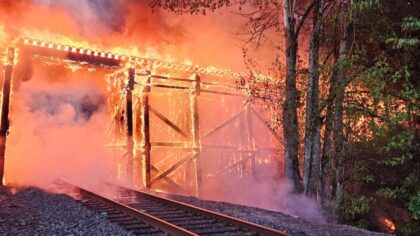 One person injured as several hundred feet of train trestle burns in Snohomish