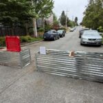 One of the large industrial steel planters blocking off three residential side streets at N. 97th, 98th, and 102nd Streets near Aurora Avenue. (Photo: Charlie Harger, Seattle's Morning News)