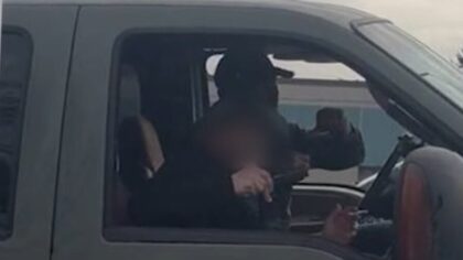 Burien police decline charges after video appears to show woman brandishing gun at students protesting ICE