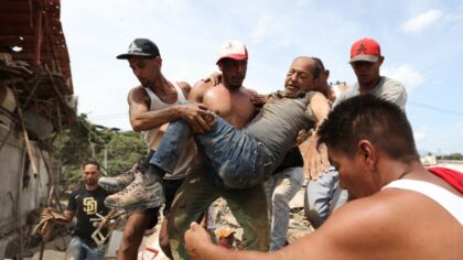Neighbors dig through Venezuela rubble to search for loved ones as death toll climbs