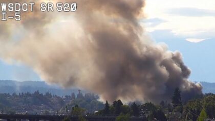 100+ firefighters battle Ballard warehouse fire — roof collapses, one firefighter injured