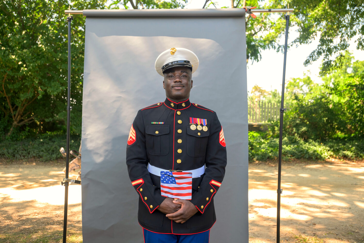 New U.S. citizen and twice-deployed U.S. Marine Sgt. Diakaria Sangare, from Guinea, poses for a por...