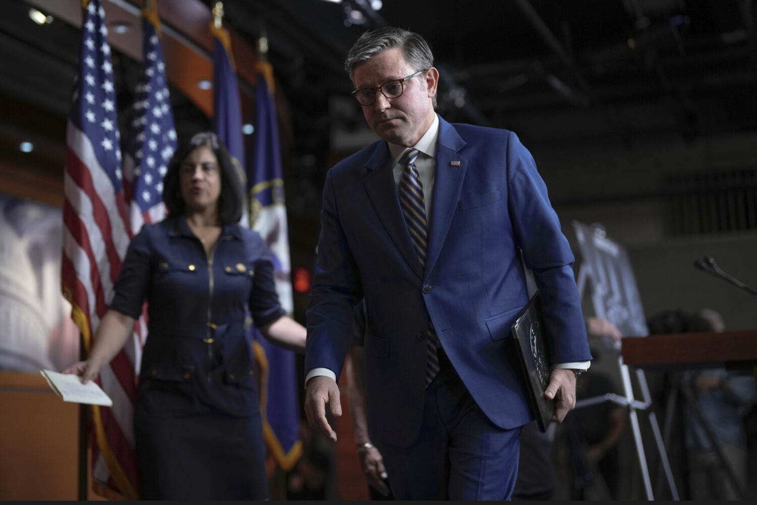 Speaker of the House Mike Johnson, R-La., and GOP leaders depart after meeting with reporters as he...
