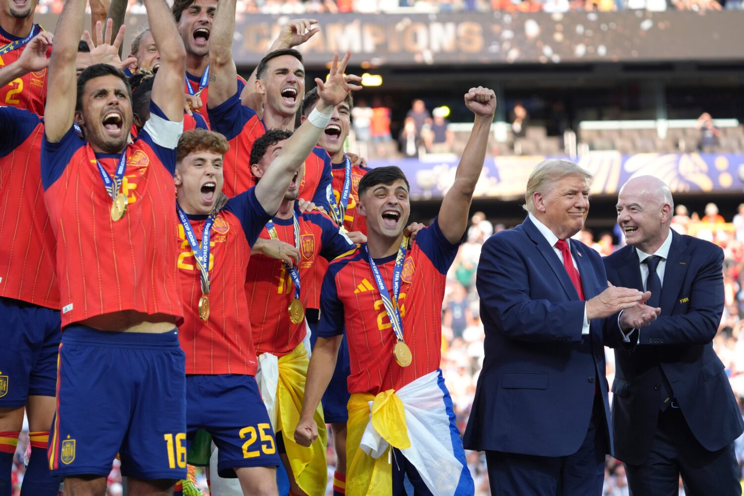 Spain players, from left, cheer alongside President Donald Trump and FIFA President Gianni Infantin...