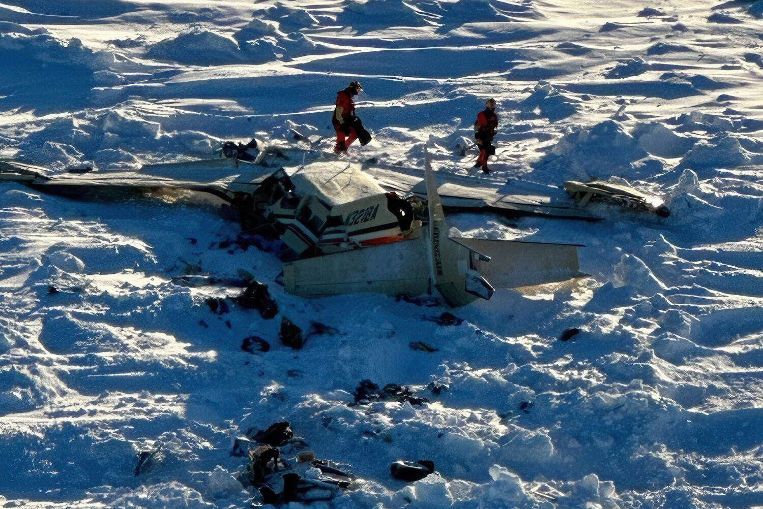 FILE - This photo provided by the U.S. Coast Guard on Feb. 7, 2025, shows a small commuter plane th...