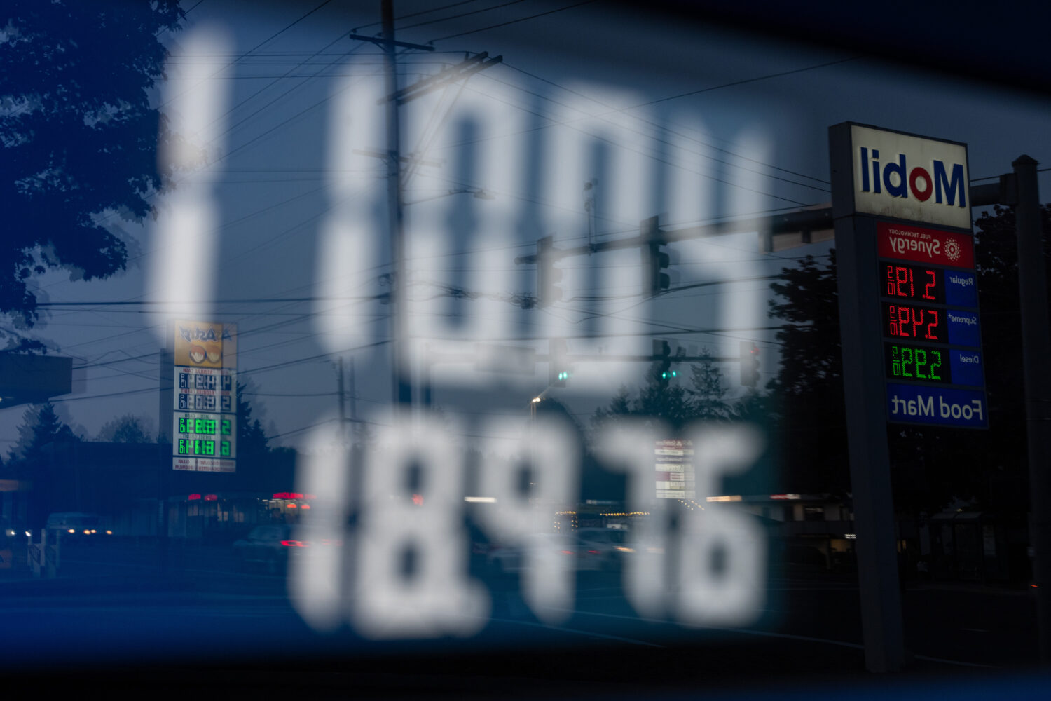 FILE - A display shows $110.04 for gasoline on a fuel pump at a Mobil gas station on Wednesday, Apr...