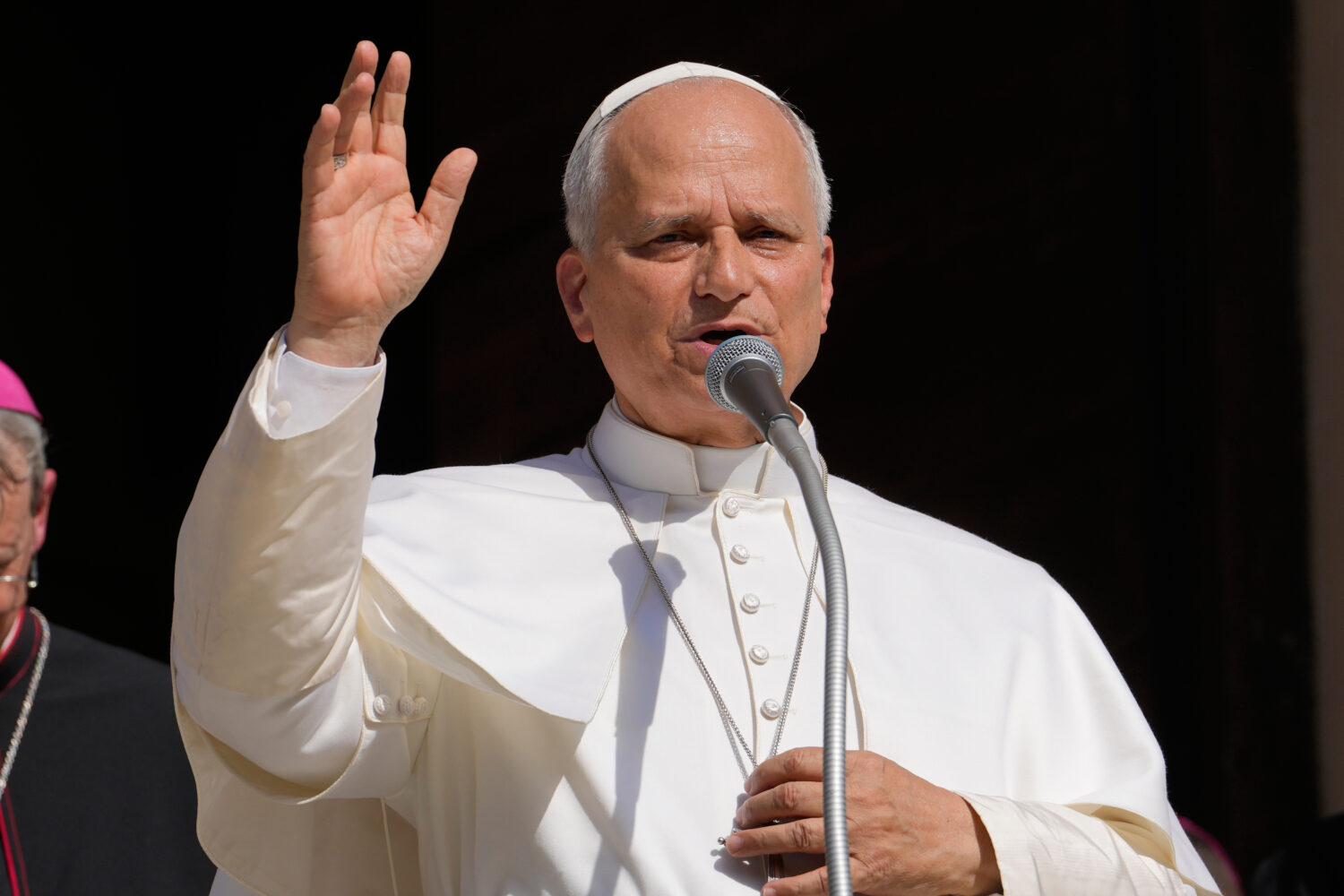 FILE - Pope Leo XIV delivers his blessing as he visits Pavia's Cathedral, northern Italy, on June 2...