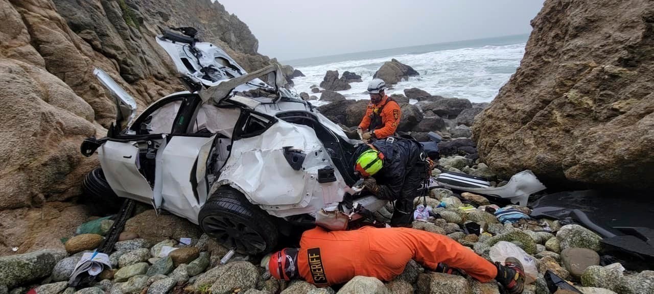 FILE - In this photo provided by the San Mateo County Sheriff's Office, emergency personnel respond...