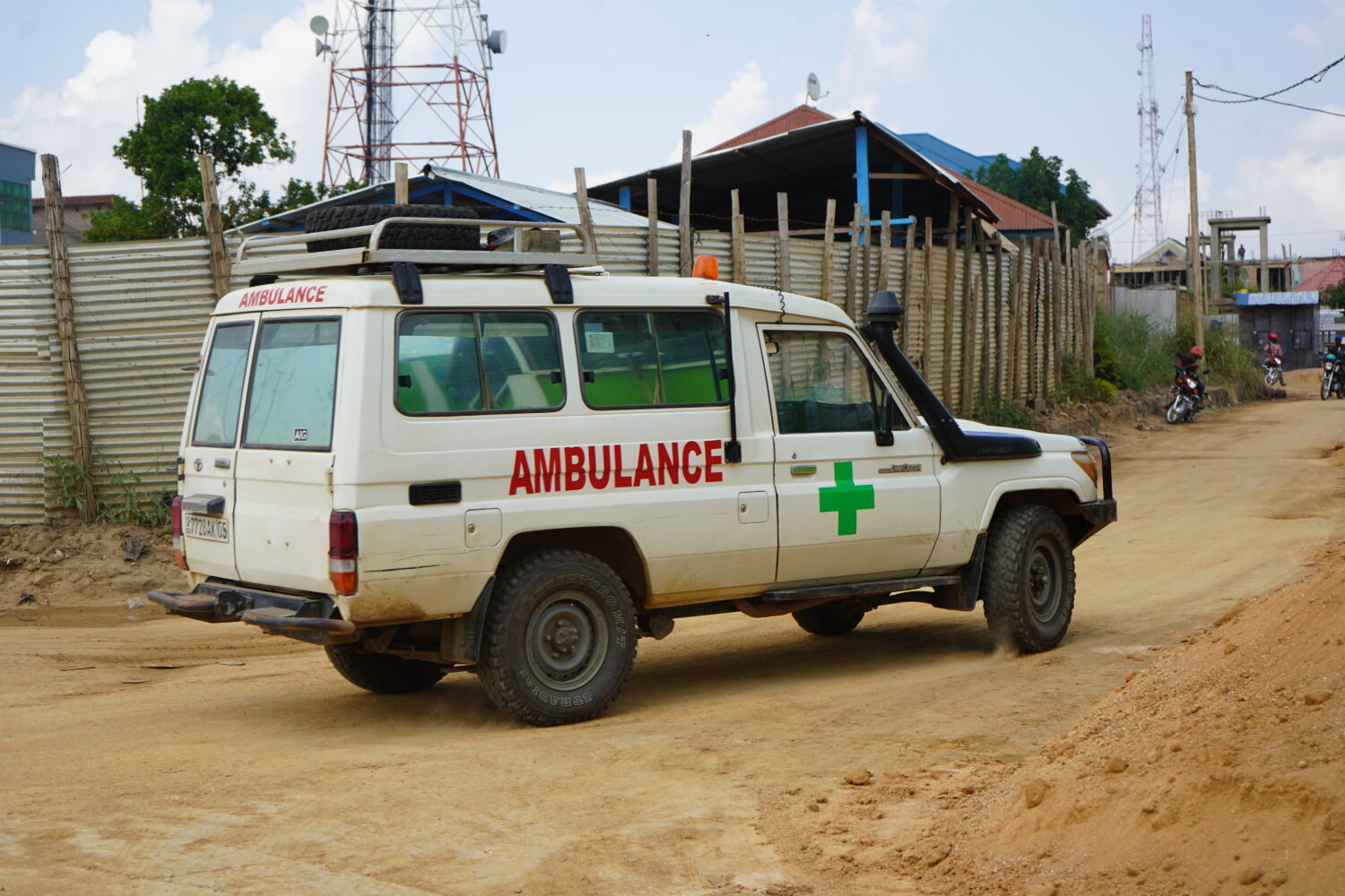 An ambulance drives past an ebola treatment centre in Bunia, Congo, Monday, July 20, 2026. (AP Phot...