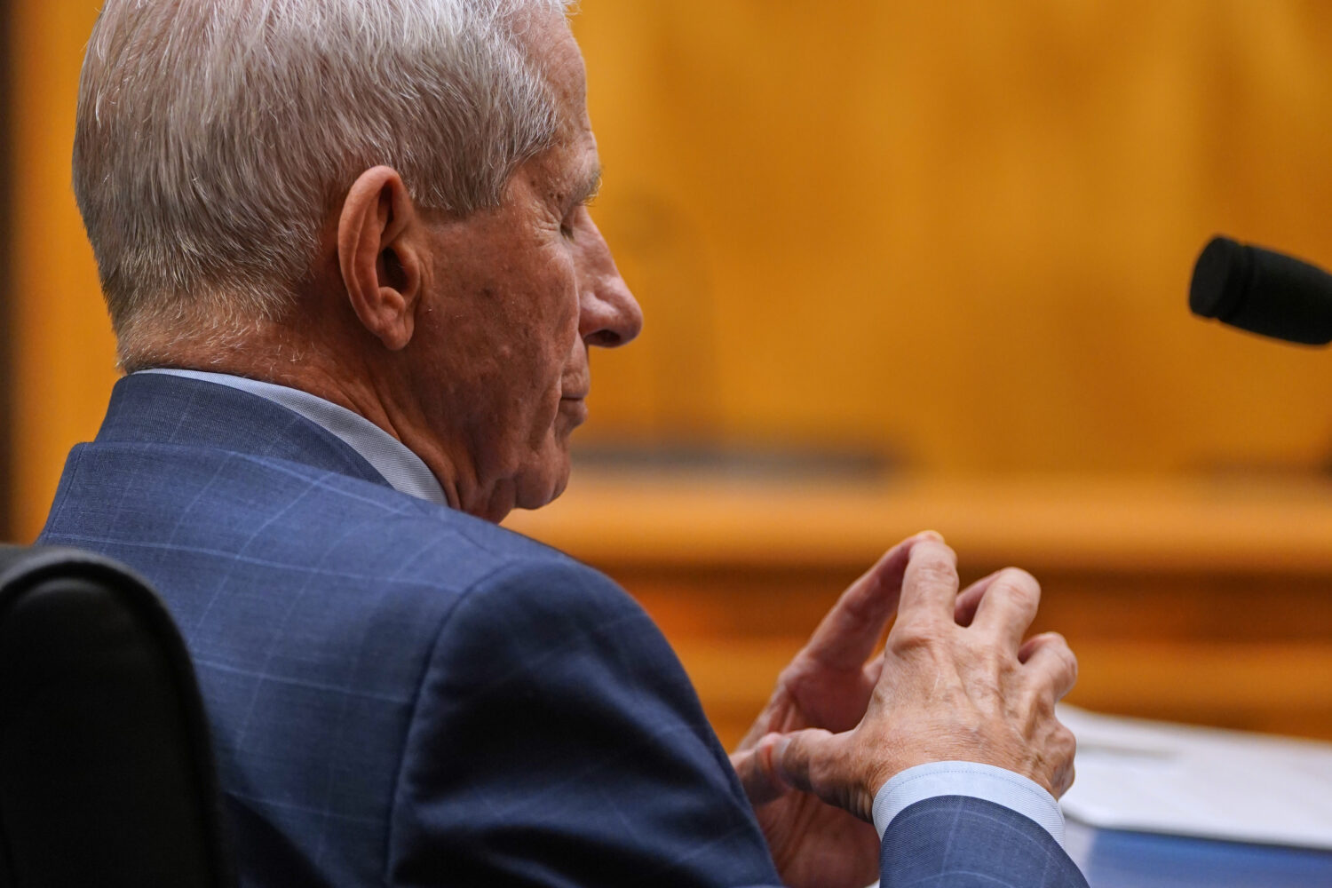 Dr. Anthony Fauci listens as he appears before the Senate Homeland Security and Governmental Affair...
