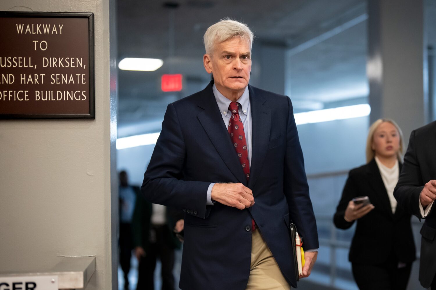 FILE - Sen. Bill Cassidy, R-La., heads to a closed-door Republican policy meeting at the Capitol in...