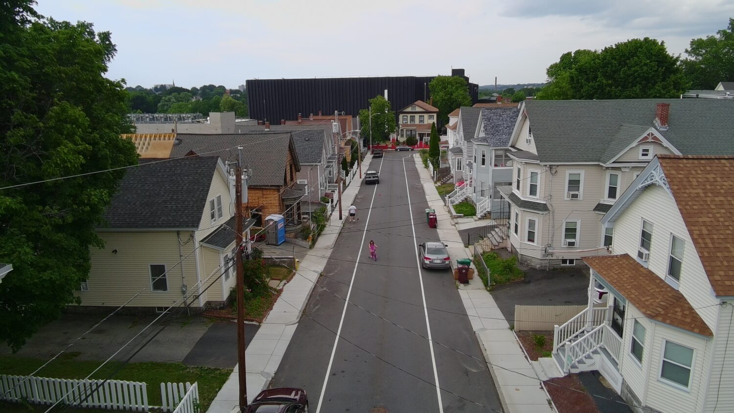 A data center built by the Markley Group looms over a residential neighborhood in Lowell, Mass., on...