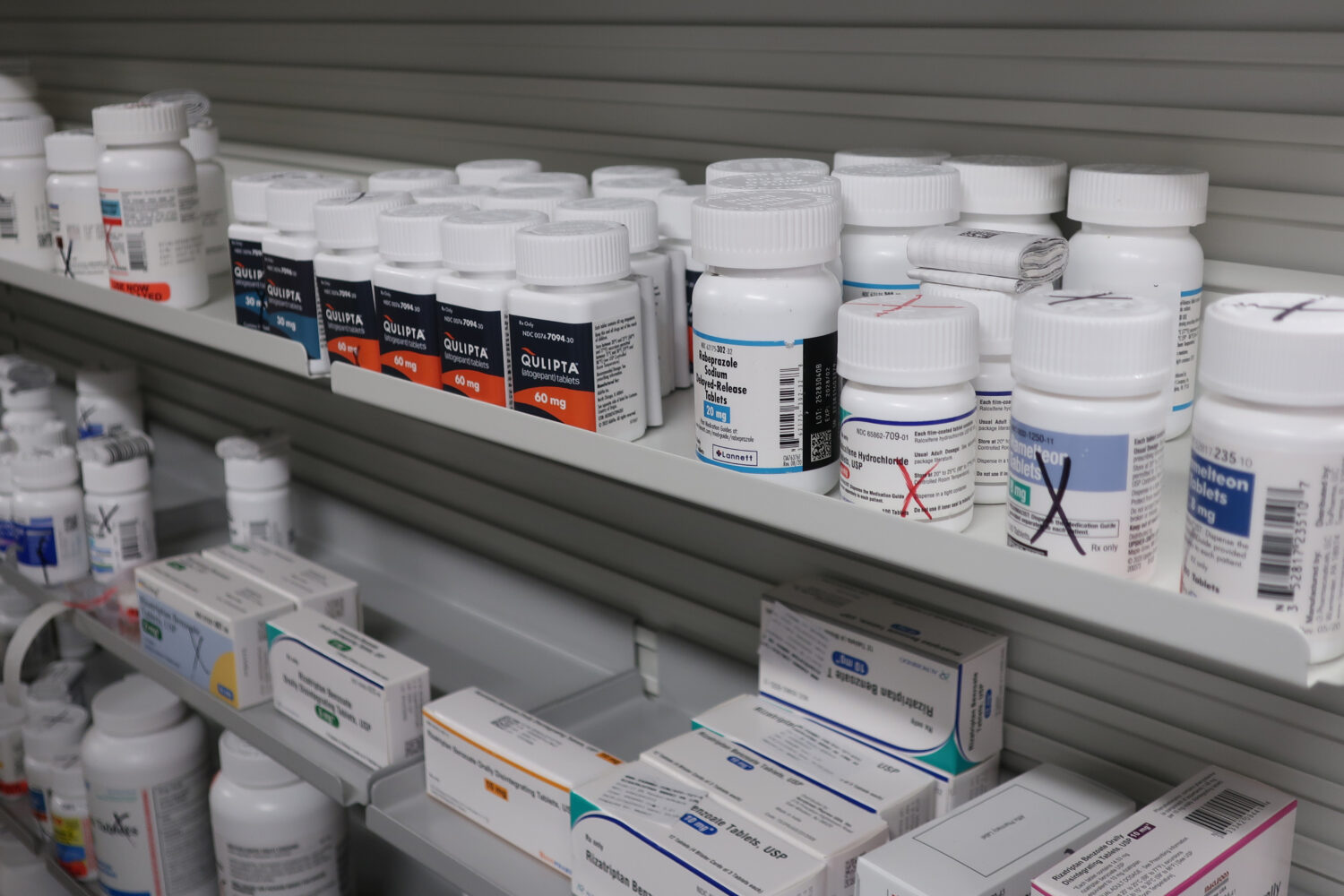 Bottles of medications sit on shelves at the Stormont Vail Retail Pharmacy in Topeka, Kan., Tuesday...