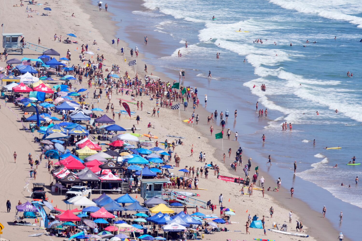 Beach goers watch during the the 46th Annual California Surf Lifesaving Championships on Will Roger...