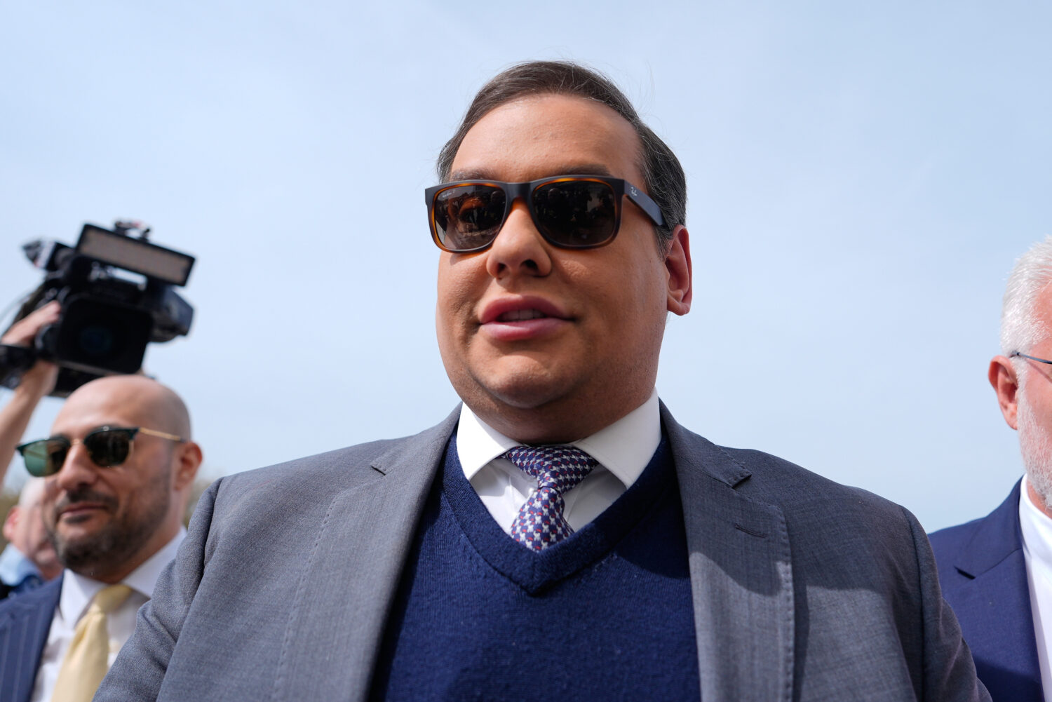 FILE - Former Rep. George Santos arrives at federal court for sentencing, April 25, 2025, in Centra...