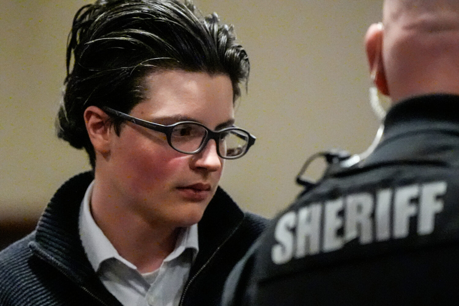 FILE - School shooting suspect Colt Gray exits the Barrow County Courthouse, Dec. 9, 2025, in Winde...
