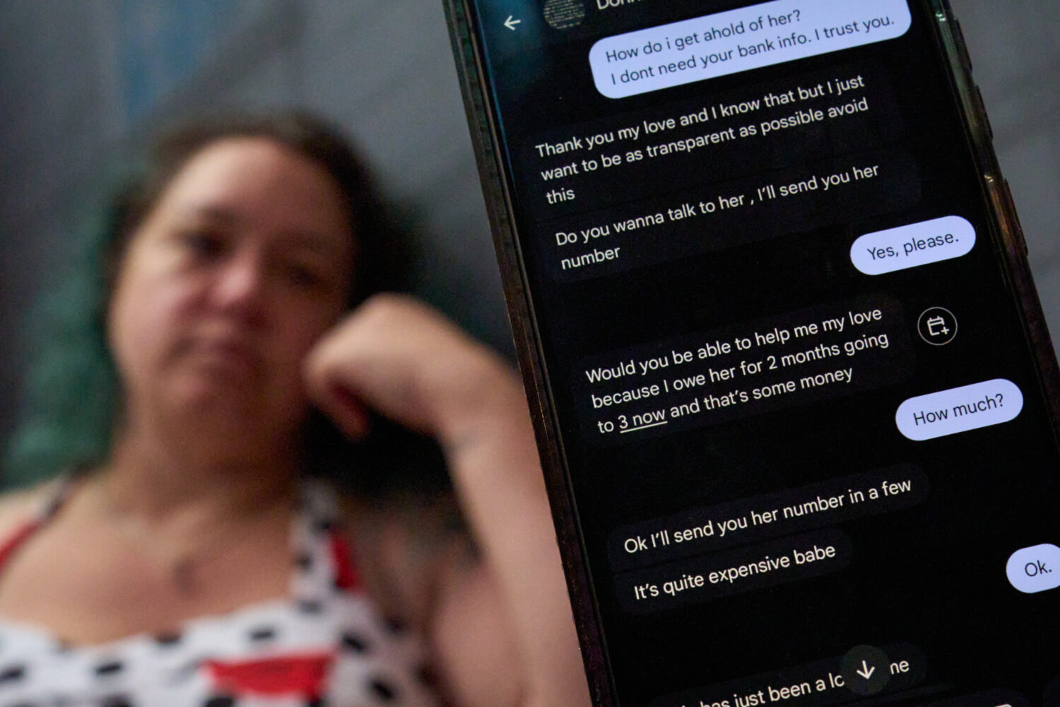 A text message exchange between Jean Booth and her romance scammer are seen on her phone, Oct. 3, 2...