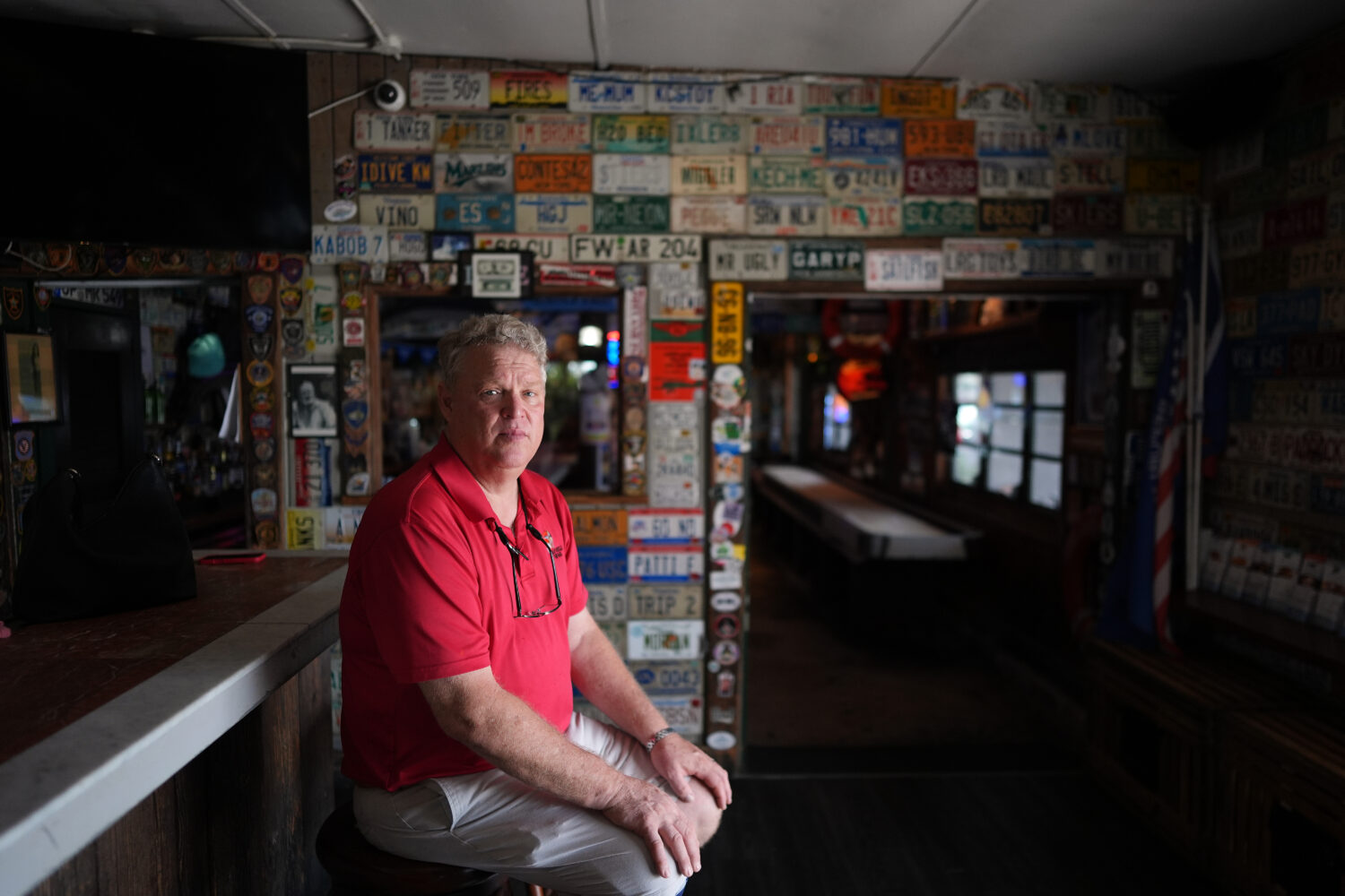 Bobby Kuchinsky, general manager of Half Shell Raw Bar, poses for a portrait inside his restaurant,...