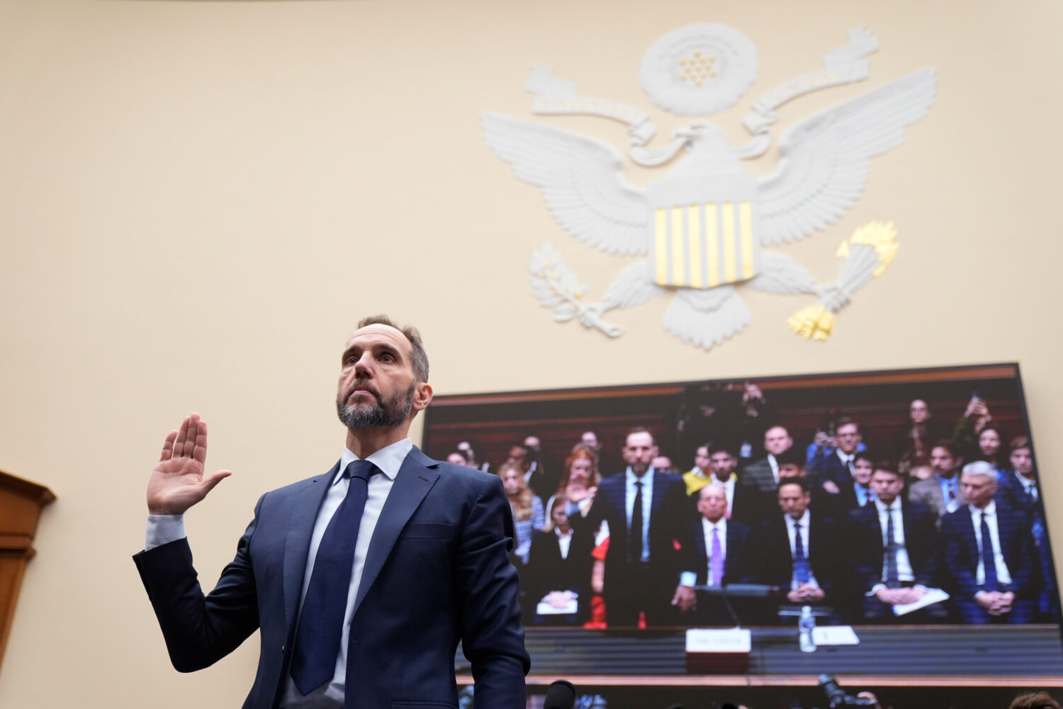 FILE - Former Justice Department special counsel Jack Smith takes an oath before the House Judiciar...
