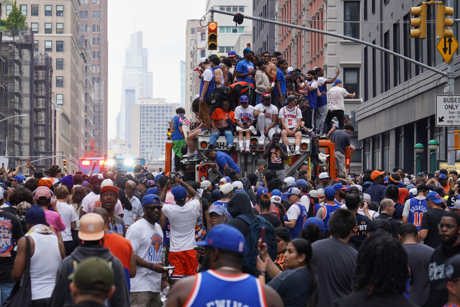 Fans celebrate during the New York Knicks' NBA championship parade Thursday, June 18, 2026, in New ...